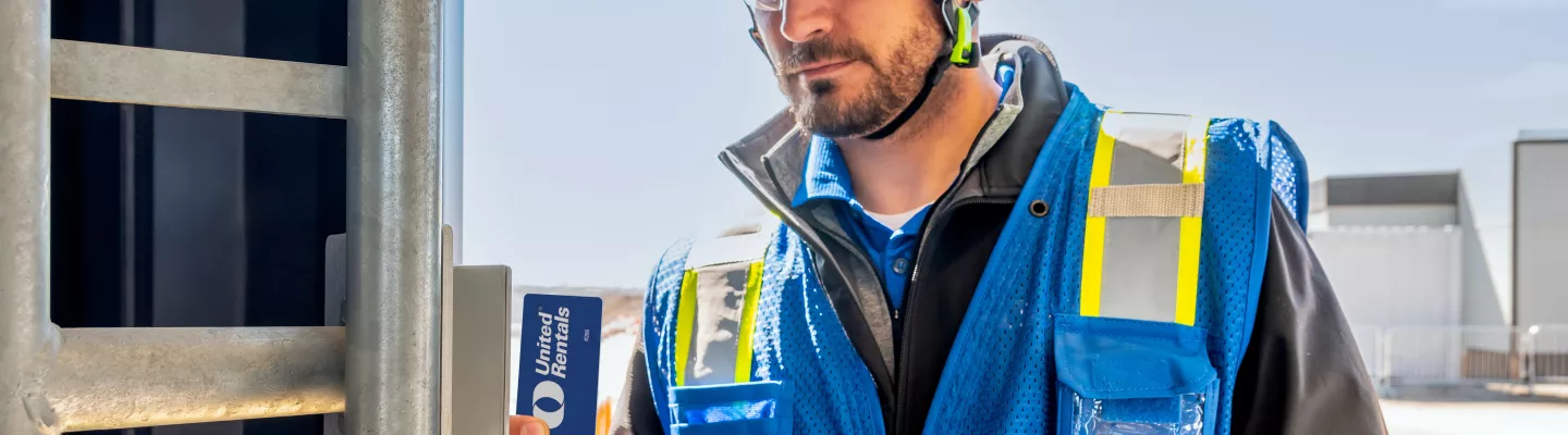 man on jobsite with turnstiles