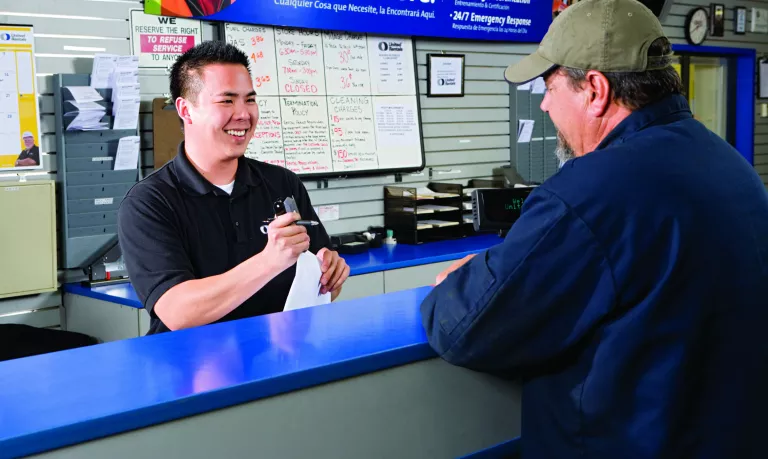 United Rentals Employee With Customer