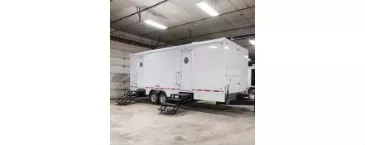 white restroom trailer