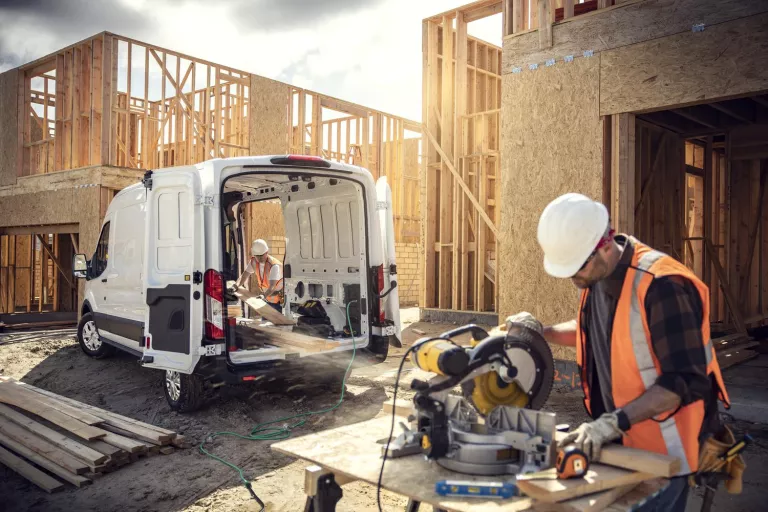 Ford Pro F-150 Lightning trucks near jobsite