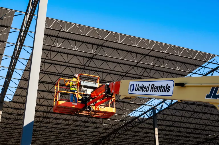 Extended boom on jobsite