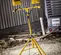 Yellow and black SOUTHWIRE Portable Light Stand, 1,000W, Halogen