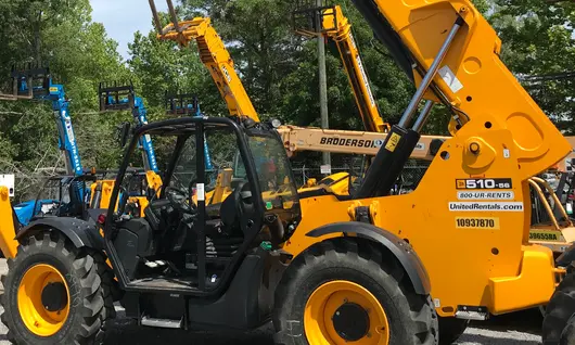 A large forklift on a worksite.