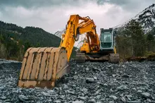 Construction equipment in use on-site, optimizing workflow to maximize efficiency and ensure timely project completion.